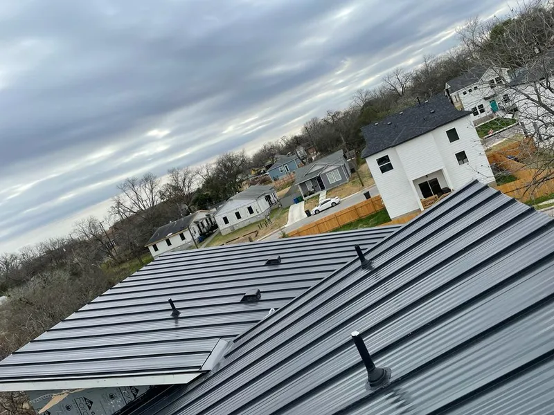 Standing seam metal roof panels with vents for Skylight Repair in Dolton